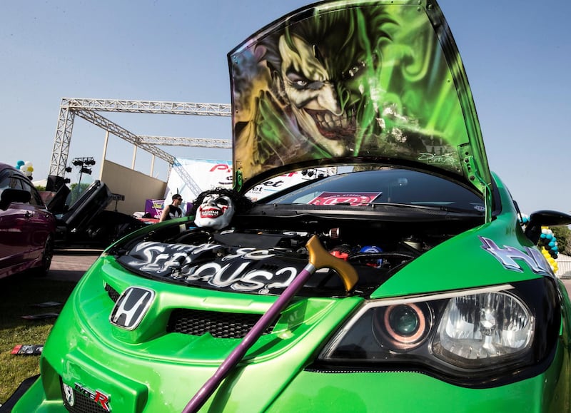 ABU DHABI, UNITED ARAB EMIRATES, 28 OCTOBER 2018 -A Honda Civic with Joker design owned by Louie Manalac at the Street Meet modified cars event, Abu Dhabi City Golf Club.  Leslie Pableo for The National for Adam Workman's story