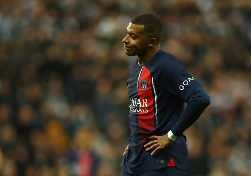 Paris Saint-Germain's Kylian Mbappe looks distraught. Reuters