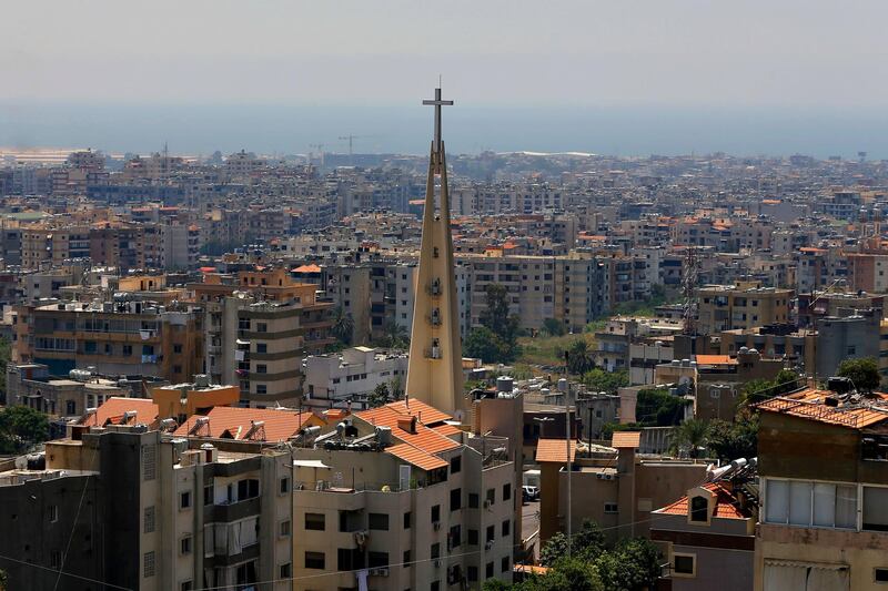This Monday, June 24, 2019 photo, shows a church in the village of Hadat, where only Christians can rent or buy property, near Beirut, Lebanon. The town's Muslim ban, imposed years ago, has recently sparked a national outcry. The case reflects Lebanon's rapidly changing demographic make-up against the backdrop of deep-rooted sectarian divisions that once erupted into a 15-year civil war. (AP Photo/Bilal Hussein)
