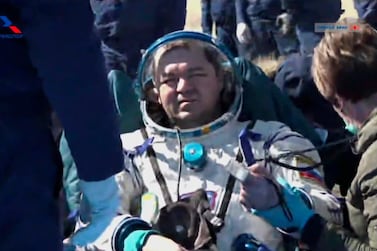A grab from video footage released by Roscosmos space agency shows Russian cosmonaut Oleg Skripochka shortly after returning from the International Space Station aboard the Soyuz MS-15 space capsule near the town of Dzhezkazgan, Kazakhstan on April 17, 2020. Roscosmos Space Agency via AP