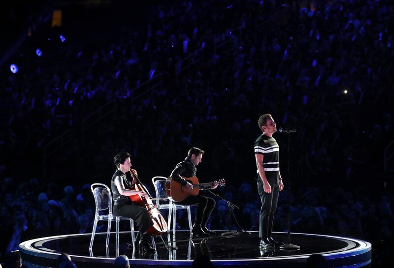 Ben Platt, right, performs 'Somewhere' during a tribute to Leonard Bernstein and Andrew Lloyd Webber Matt Sayles / Invision / AP