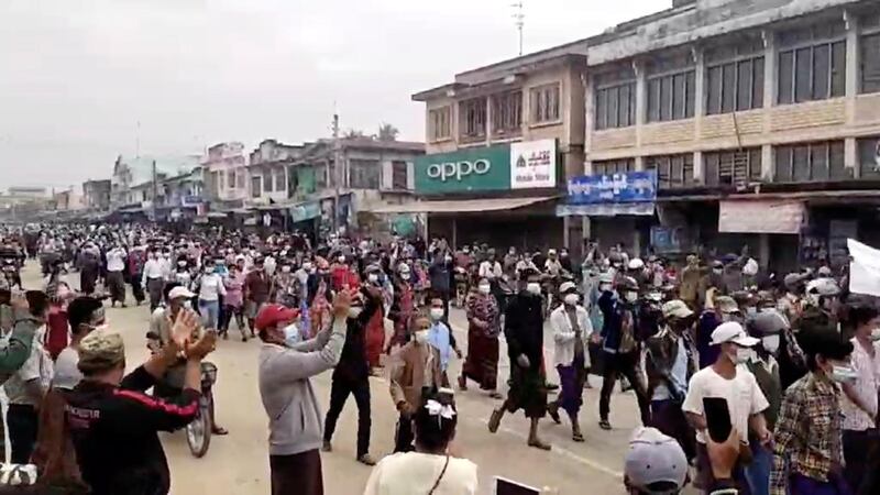 People march in protest against the February 1 coup in Paungde, Bago, Myanmar in this still image from video. Reuters