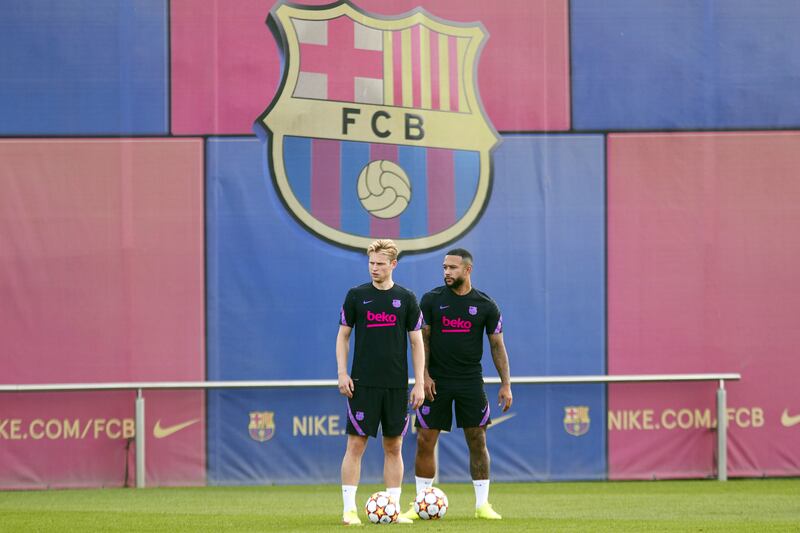 Barcelona's Memphis Depay, right, and Frenkie de Jong at the Joan Gamper Sports Complex. EPA