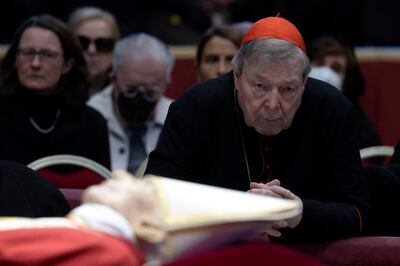 Australian Cardinal George Pell prays near the body of the late Pope Benedict XVI in the Saint Peter Basilica in Vatican City on January 3. EPA