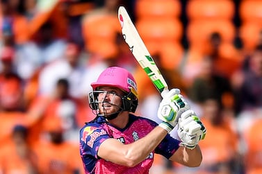 Rajasthan Royals' Jos Buttler watches the ball after playing a shot during the Indian Premier League (IPL) Twenty20 cricket match between Sunrisers Hyderabad and Rajasthan Royals at the Rajiv Gandhi International Cricket Stadium in Hyderabad on April 2, 2023.  (Photo by Noah SEELAM  /  AFP)  /  IMAGE RESTRICTED TO EDITORIAL USE - STRICTLY NO COMMERCIAL USE