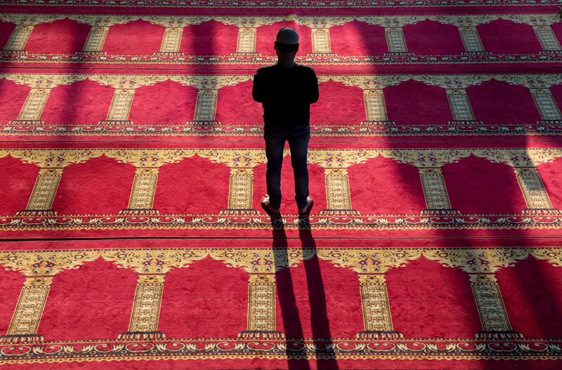 A worshipper at Friday prayers at the Kashmiri Masjid in Kathmandu, Nepal. EPA