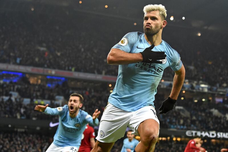 Manchester City's Argentinian striker Sergio Aguero celebrates after scoring the opening goal of the English Premier League football match between Manchester City and Liverpool at the Etihad Stadium in Manchester, north west England, on January 3, 2019. (Photo by Paul ELLIS / AFP) / RESTRICTED TO EDITORIAL USE. No use with unauthorized audio, video, data, fixture lists, club/league logos or 'live' services. Online in-match use limited to 120 images. An additional 40 images may be used in extra time. No video emulation. Social media in-match use limited to 120 images. An additional 40 images may be used in extra time. No use in betting publications, games or single club/league/player publications. / 