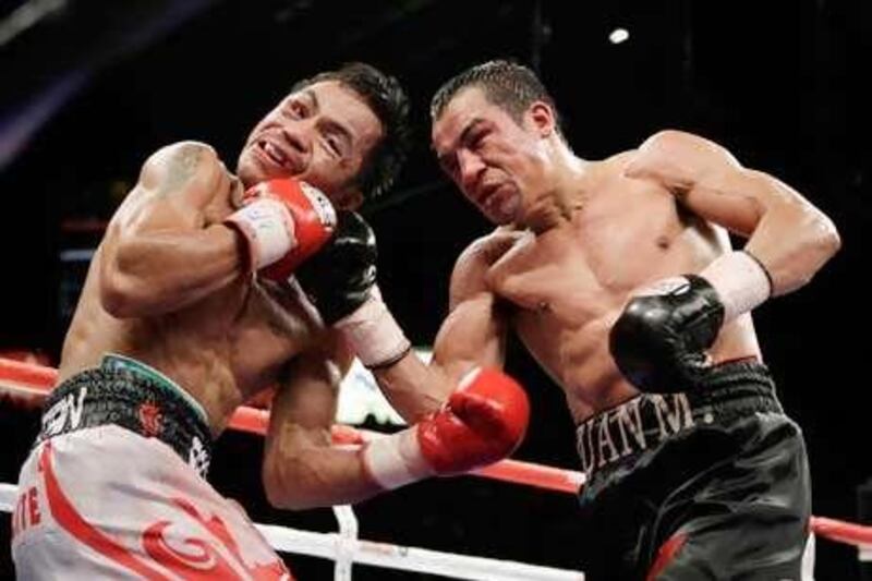 Juan Manuel Marquez, right, wants a rematch with Manny Pacquiao.