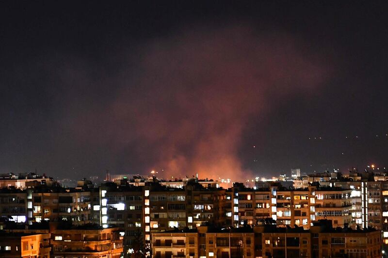 Smoke billows following an Israeli airstrike targeting south of the capital Damascus, on July 20, 2020. Israeli strikes south of the Syrian capital wounded seven Syrian soldiers, state media reported, in an attack which a war monitor said hit several positions of regime forces and Iran-backed militias. / AFP / STR
