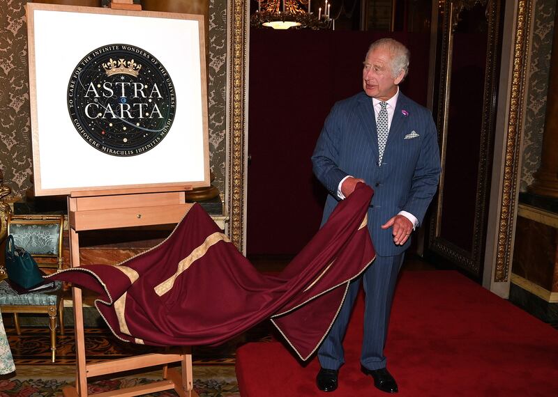 King Charles III unveils a plaque at the launch of the Sustainable Markets Initiative's Astra Carta framework to promote sustainability across the space industry. AFP