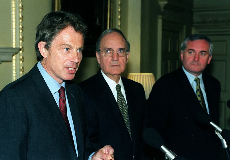 Mr Blair, former US Senator George Mitchell and Mr Ahern, at Downing Street, London, to announce a review of the Northern Ireland peace process in July 1999. PA