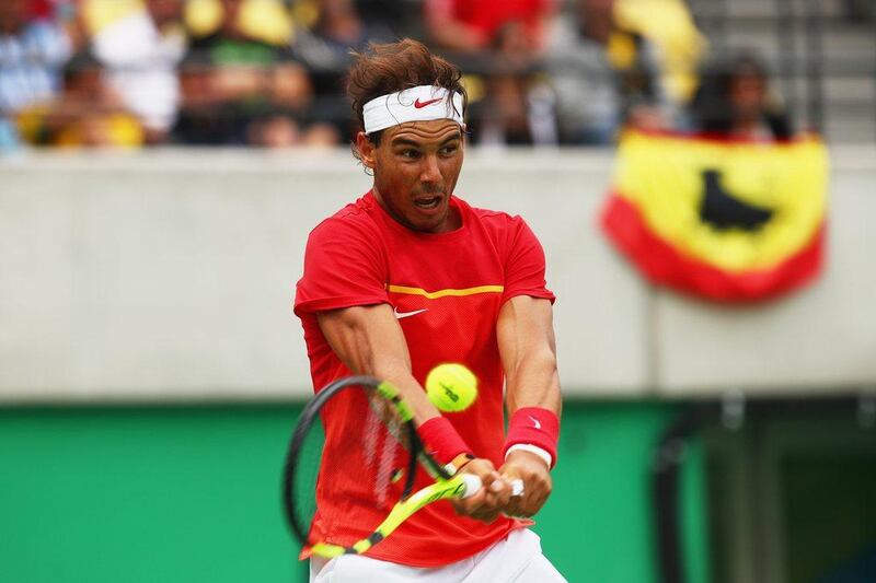 Rafael Nadal of Spain plays a backhand during the men’s singles third round match against Gilles Simon of France on Day 6 of the 2016 Rio Olympics at the Olympic Tennis Centre on August 11, 2016 in Rio de Janeiro, Brazil. Clive Brunskill / Getty Images