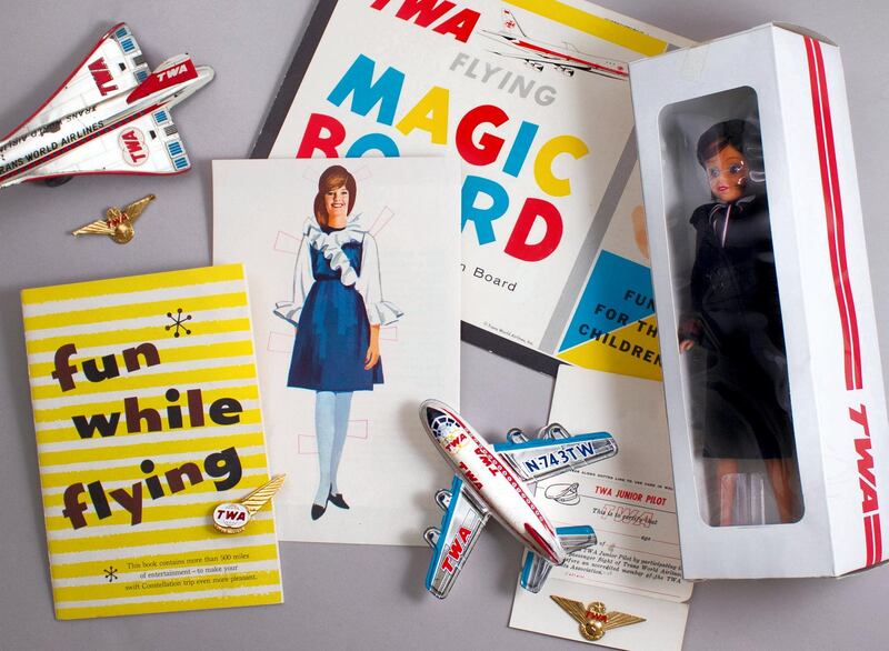 Memorabilia on display at the TWA Hotel includes airplane models, flight crew dolls and original books that were distributed to children on flights. Courtesy TWA Hotel