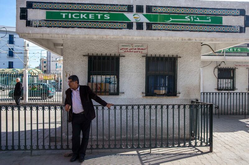 A passengers waits at a closed Tunis subway station. AP Photo