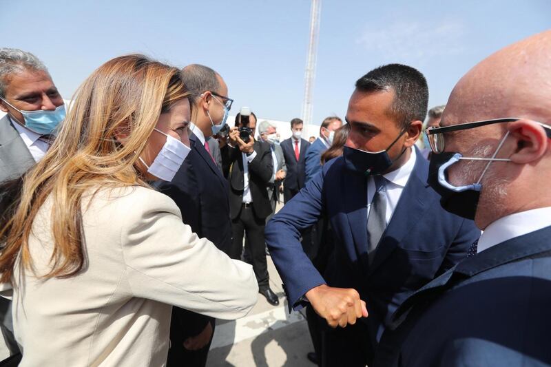 Italian foreign minister Luigi Di Maio is greeted with an  elbow bump by Tunisian interim foreign minister, Selma Ennaifer, on his arrival at an airport in Tunis, Tunisia.  EPA