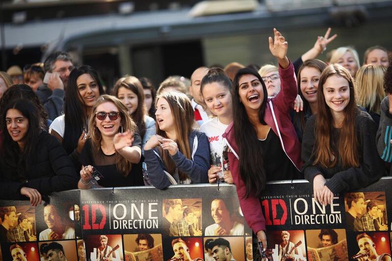 One Direction fans take their positions in Leicester Square ahead of the premier to the bands new film This Is Us. Getty Images