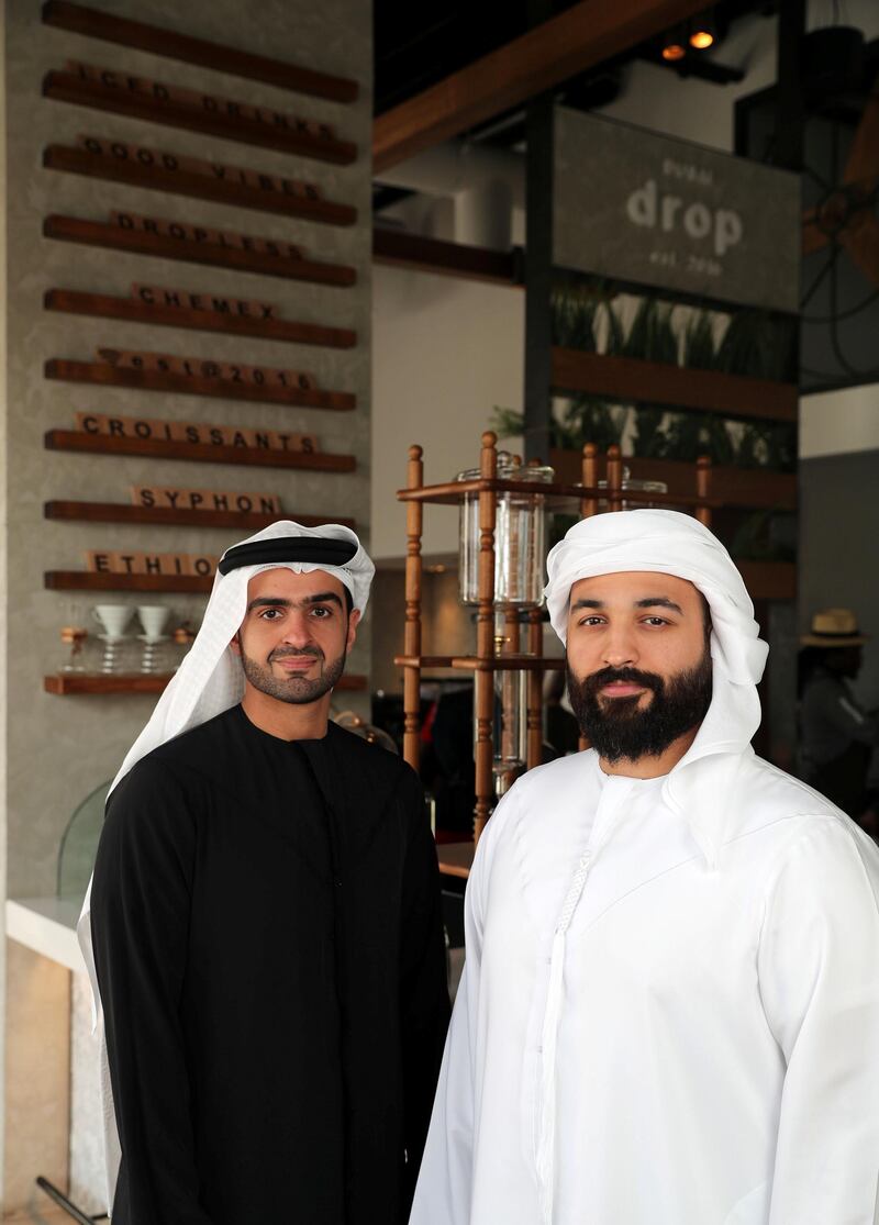 Dubai, United Arab Emirates - January 25th, 2018: Founders of Drop Mahmood Al Khamis (R) and Ghanim Al Qassim. ÔThe new wave of Emirati coffee cultureÕ Ð a look at the popularity of specialist coffee stores. Thursday, January 25th, 2018 at Drop, Dar Wasl, Dubai. Chris Whiteoak / The National