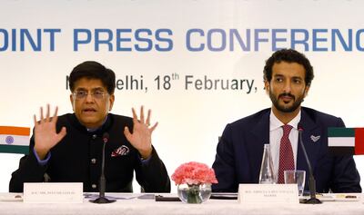 Piyush Goyal, India's Minister of Commerce and Industry, gestures as Abdulla bin Touq Al Marri, the UAE's Minister of Economy, looks on during their joint news conference in New Delhi on Friday. Reuters