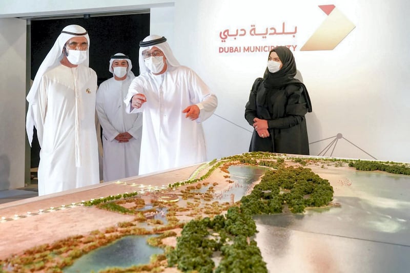 Sheikh Mohammed bin Rashid, Vice President and Ruler of Dubai, reviews plans for a beach-side development. Courtesy: Dubai Media Office