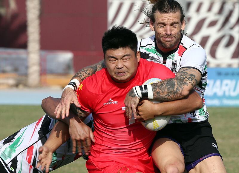 UAE and China in action during the Dialog Asia Rugby Sevens Series at Rugby Park in Dubai Sports City.
