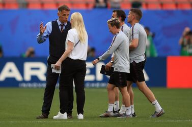 England manager Phil Neville, left, has heavily criticised the behaviour of his side’s opponents. Marc Atkins / Getty Images