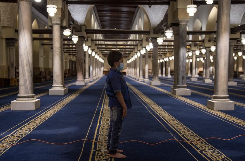 A boy performs Laylat al-Qadr (Arabic for Night of Destiny) prayer inside Al Azhar mosque in Egypt, Cairo.  EPA