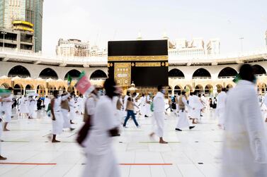 Muslim pilgrims wearing face masks and keeping social distance perform Tawaf around Kaaba during the annual Haj pilgrimage amid the coronavirus disease (COVID-19) pandemic, in the holy city of Mecca, Saudi Arabia July 31, 2020. Saudi Press Agency/Handout via REUTERS ATTENTION EDITORS - THIS PICTURE WAS PROVIDED BY A THIRD PARTY.