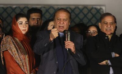 Nawaz Sharif, leader of the Pakistan Muslim League-Nawaz, addresses supporters in Lahore as votes in the general election were counted on Friday night. EPA