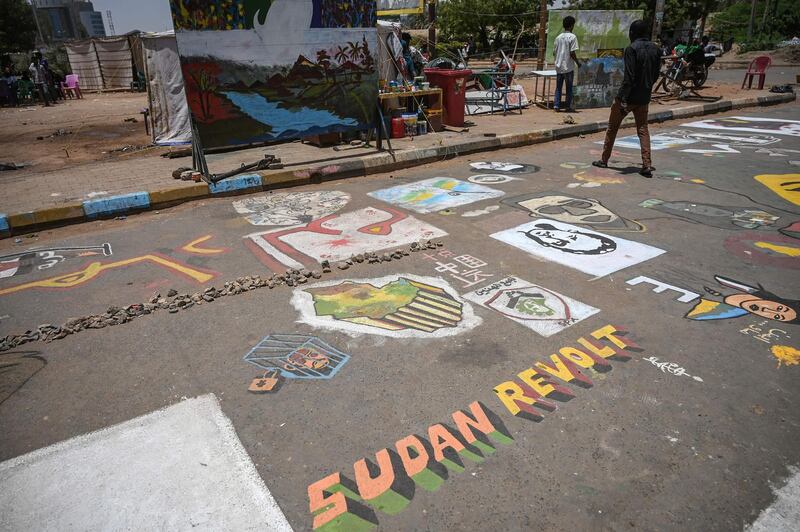 Recently painted murals on a street during a sit-in outside the army headquarters in the capital Khartoum.  AFP