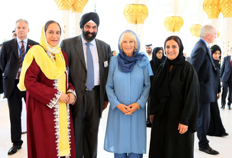 ABU DHABI, UNITED ARAB EMIRATES - November 06, 2016: The Duchess of Cornwall (2nd R) and HH Sheikha Lubna Al Qasimi, UAE Minister of State for Tolerance (L), stand for a photograph with representatives of different religious groups in the UAE, during a "Celebration of Tolerance" meeting at the Sheikh Zayed Grand Mosque. 

( Pawan Singh for the Crown Prince Court - Abu Dhabi )
--- *** Local Caption ***  20161106-PS-SZM32.jpg