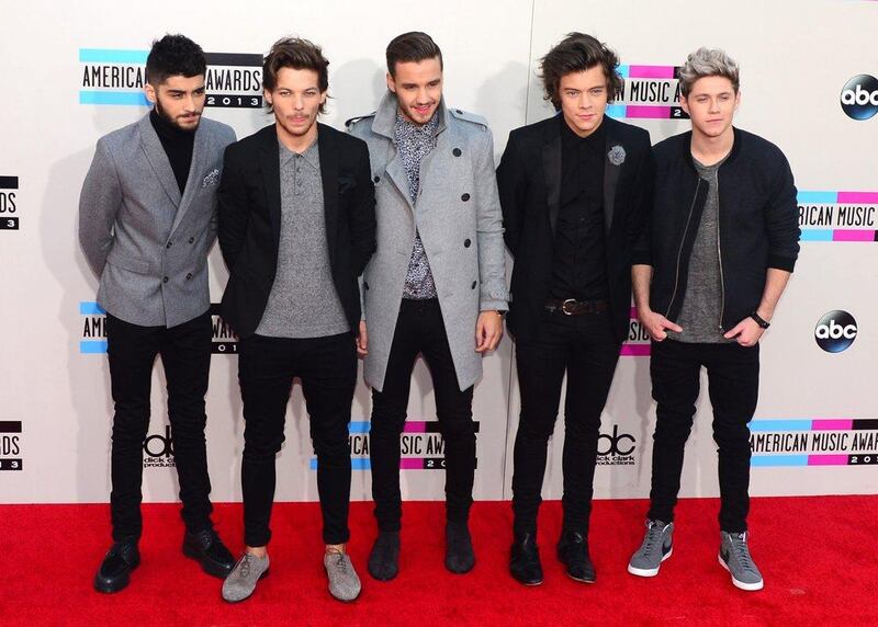 One Direction arrives for the 2013 American Music Awards at the Nokia Theatre. Frederic J. Brown / AFP Photo