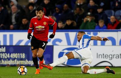 Soccer Football - FA Cup Fifth Round - Huddersfield Town vs Manchester United - John Smith’s Stadium, Huddersfield, Britain - February 17, 2018   Manchester United’s Alexis Sanchez in action with Huddersfield Town’s Mathias Jorgensen    Action Images via Reuters/Jason Cairnduff