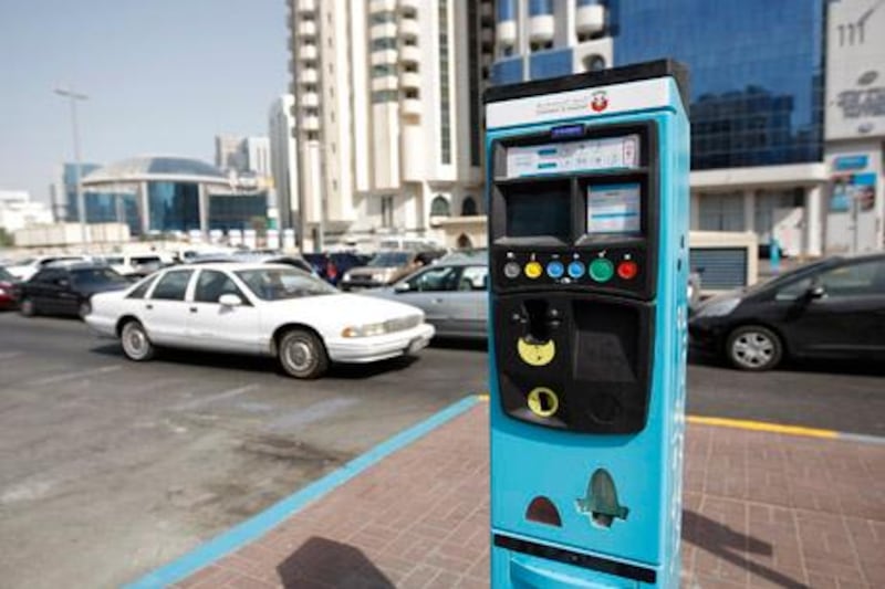 Abu Dhabi - October 5, 2009: Mawaqif parking meters near Hamdan and sixth street. ( Philip Cheung / The National )

