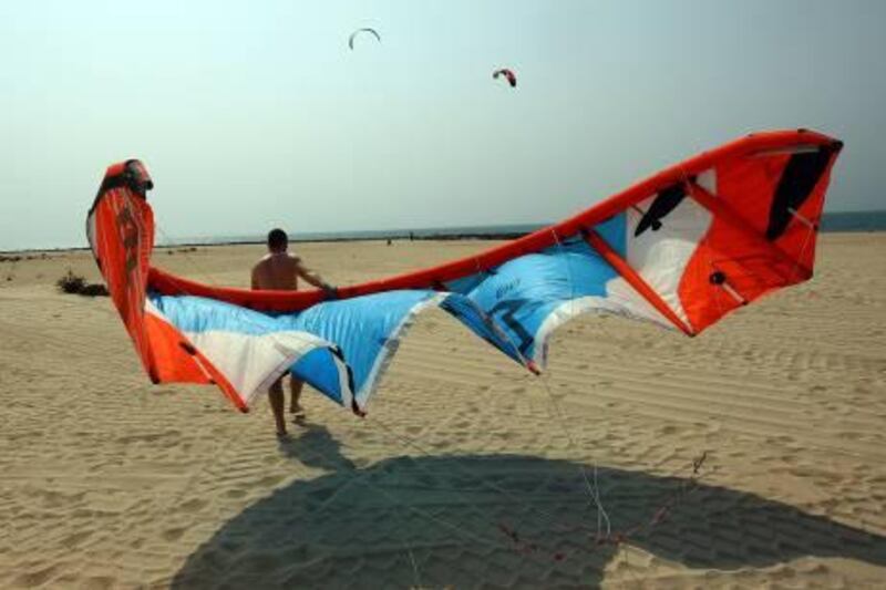 Dubai, United Arab Emirates- June 30 ,  2011:  People Kitesurfing  on Jumeirah beach in  Dubai .  ( Satish Kumar / The National )