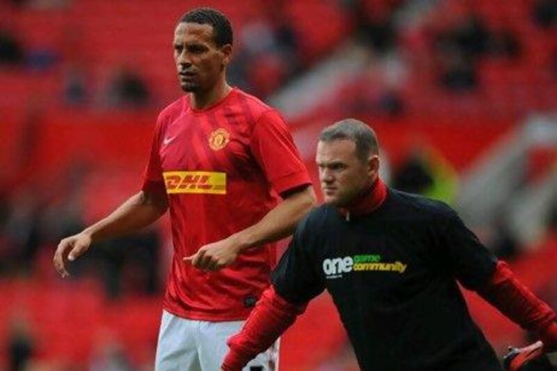 Rio Ferdinand, left, did not wear the Kick It Out T-shirt in the Premier League weekend, which annoyed Alex Ferguson, his manager at Manchester United. Michael Regan / Getty Images