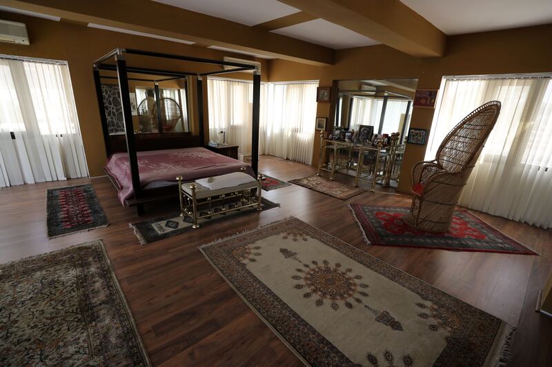 One of the bedrooms in the house features a four-poster bed.