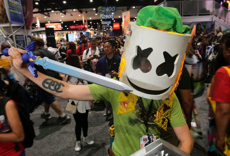Anderson Pierce cosplays as an original character he called a combination of Link from Legion of Zelda video game and a DJ named Marshmellow during Comic-Con 2017. Bill Wechter / AFP