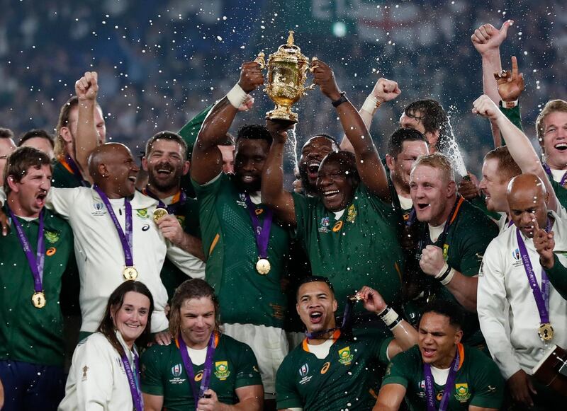 Rugby Union - Rugby World Cup - Final - England v South Africa - International Stadium Yokohama, Yokohama, Japan -South Africa players celebrate with the Webb Ellis trophy after winning the World Cup Final REUTERS