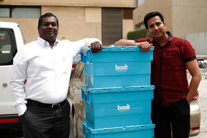 Premlal PK and Abraham Thomas, co-founders of Kuwait City-based company Boxit in front of the company's "transit warehouse" in Kuwait City. Justin Vela/The National 