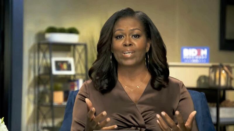 Former first lady Michelle Obama speaks during the first night of the Democratic National Convention.  AP