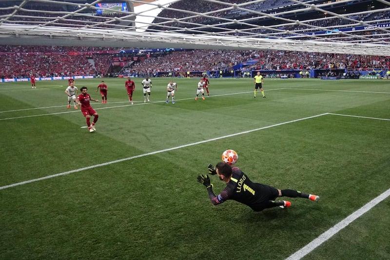 Mohamed Salah of Liverpool scores the opening goal past Hugo Lloris of Tottenham Hotspur. Getty