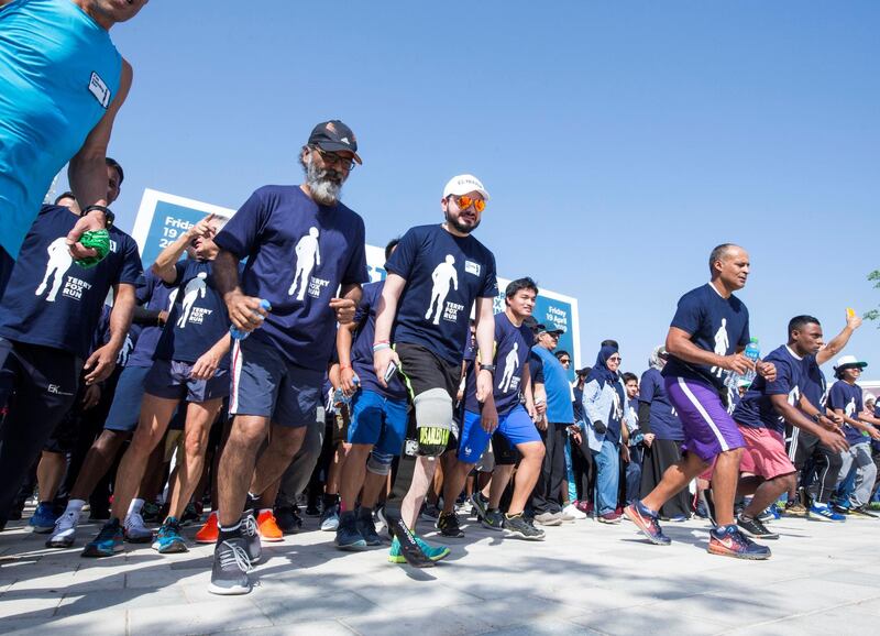ABU DHABI, UNITED ARAB EMIRATES - Tareq who lost his legs during an accident is participating in the run at the Terry Fox Run, Corniche Beach.  Leslie Pableo for The National
