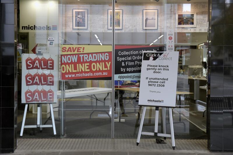 A sign for contactless service outside a store during a lockdown in Melbourne, Australia.  The city is ordering residents to stay home for the fourth time since the pandemic began as the return of infections tests the country's zero-tolerance approach to the virus. Bloomberg