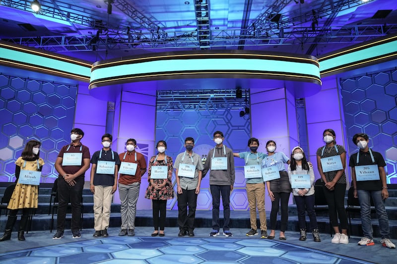 Competitors who made it to the final round stand for a group photo at the Scripps National Spelling Bee. AFP
