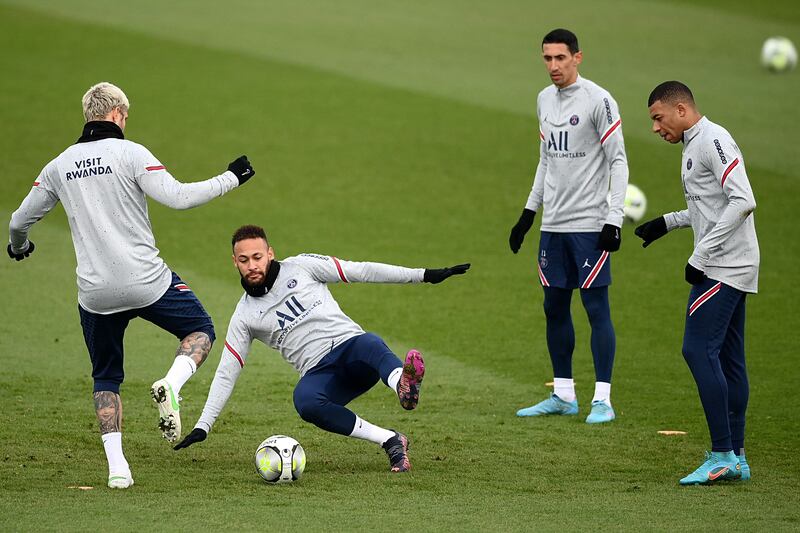 Paris Saint-Germain forward Neymar attempts a tackle. AFP