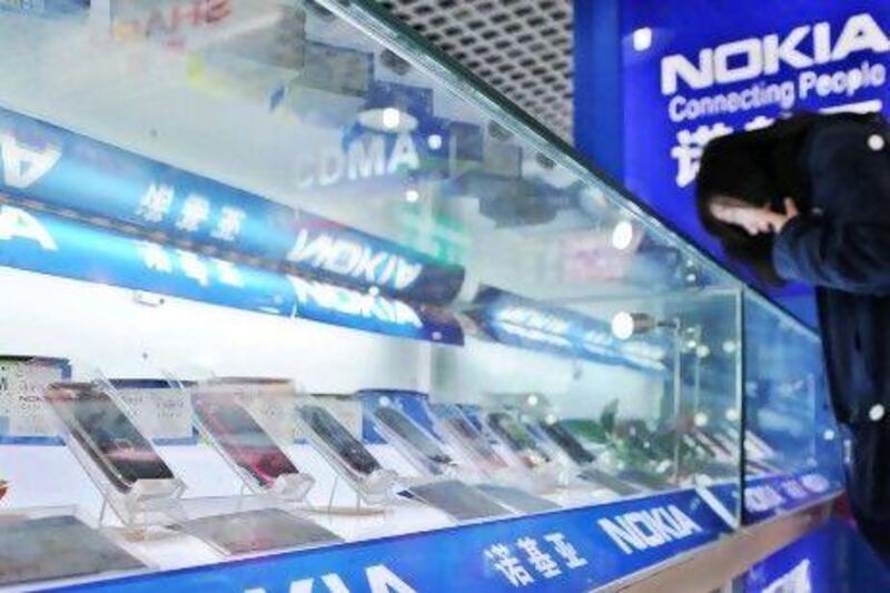 Nokia is to cut 10,000 jobs by the end of next year. (Imaginechina via AP Images)