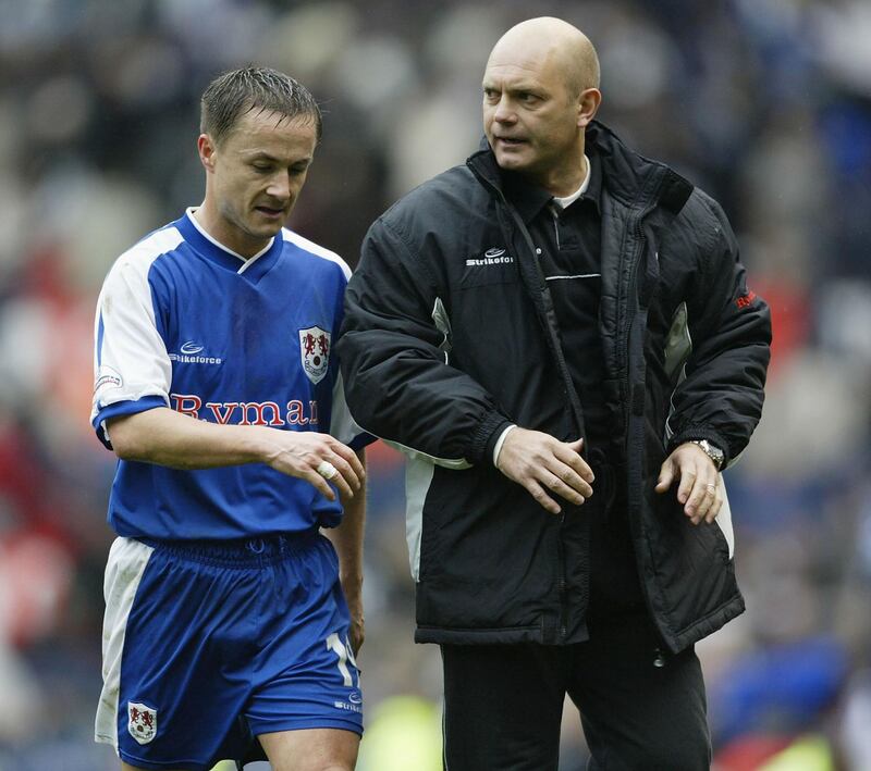 Ray Wilkins speaks to Millwall manager Dennis Wise during the FA Cup Semi Final match between Sunderland and Millwall at Old Trafford on April 4, 2004 in Manchester, England. Gary M.Prior / Getty Images