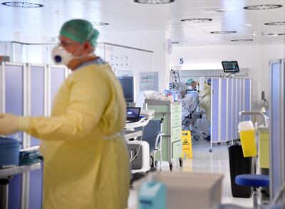Medical staff tend to a patient on an intensive care unit in Salzburg, Austria. AFP