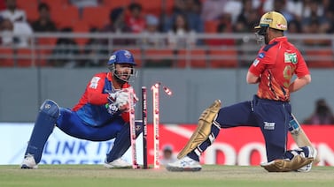 Delhi Capitals' wicketkeeper Rishabh Pant, left, stumps out Punjab Kings' Jitesh Sharma during the Indian Premier League cricket tournament match between Delhi Capitals and Punjab Kings in Mullanpur, Punjab, India, Saturday, March 23, 2024.  (AP Photo / Pankaj Nangia)