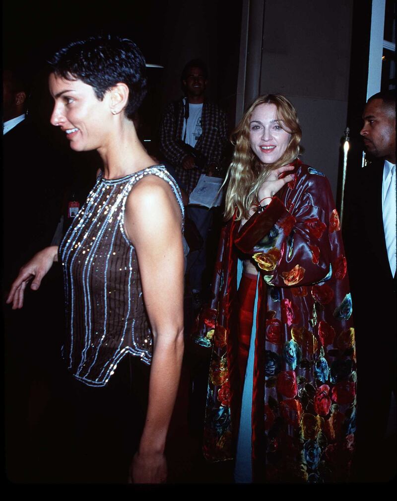 March 22, 1998 Beverly Hills Madonna with friend Ingrid as he arrives atThe Miramax Oscar''98 pre Oscar party at The Beverly Wilshire Hotel.